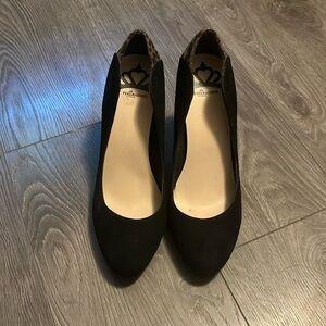 In new condition fergalicious animal print/black suede